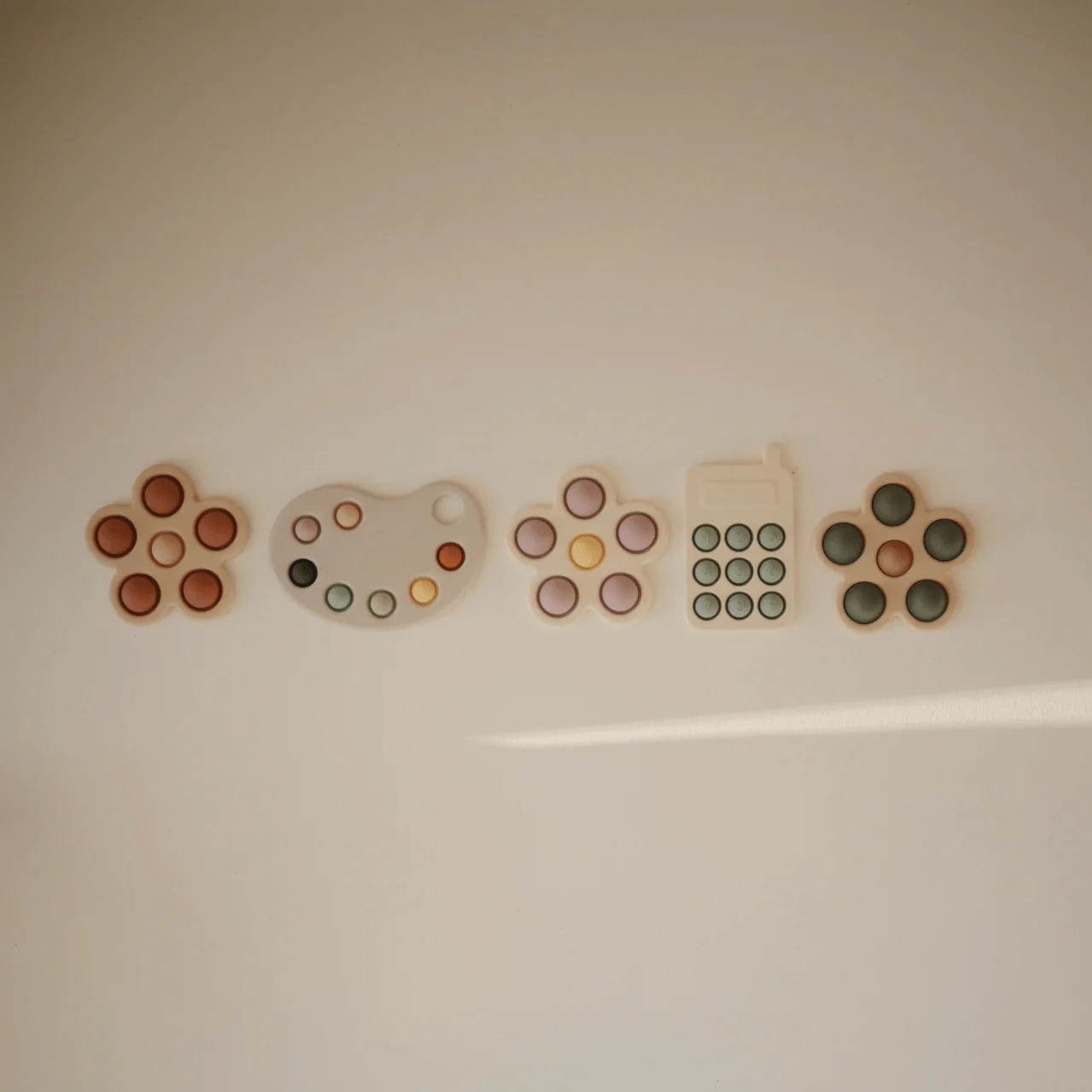 Mushie Paint Palette Press Toy - Multi