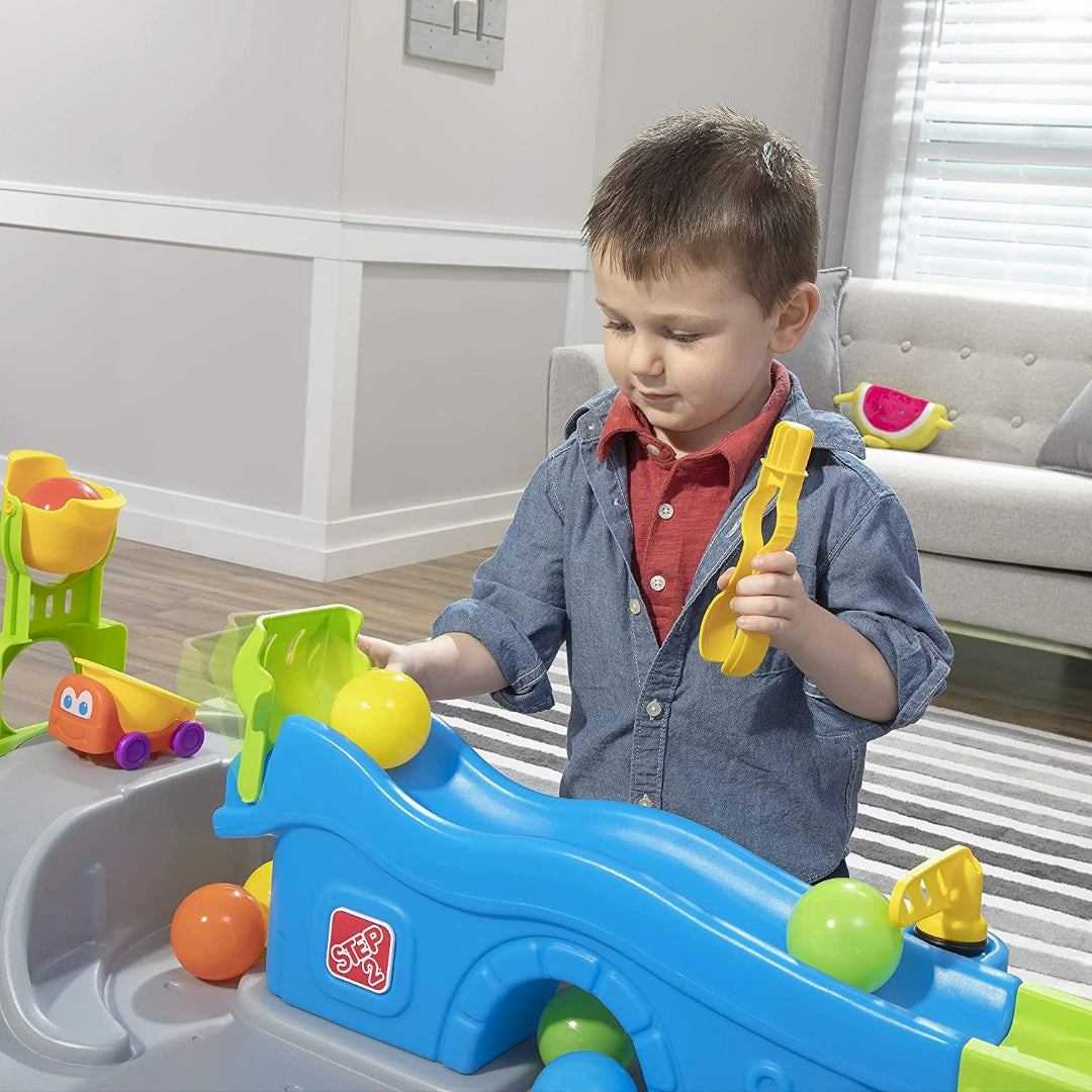 Step2 Ball Buddies Truckin' & Rollin' Play Table | STEM & Ball Toy for Toddlers | Kids Play Table with 12 Accessory Toys Included